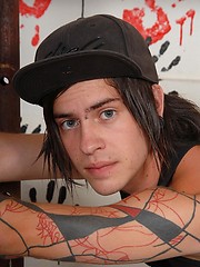 Cute emo boy demonstrates his naked body