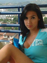 Danni takes her blue top off to show her perfectly curved body