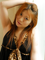 Redhead babe Seira Tagagi solo pics