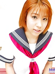 Naughty Yuri likes getting dressed in her sailor suit