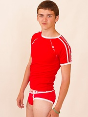 Straight fellow Danny Roulier is posing in red briefs