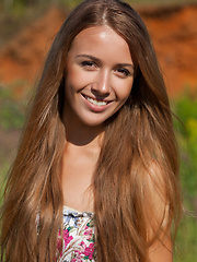 Even in the outdoors, wearing a casual flowery dress, Lina Diamond proves she has great potential to seduce anyone anywhere anytime, with her slim, sl