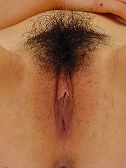 Photos of a hot naked Asian GF masturbating