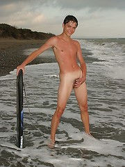 Cute sexy twinks naked by the sea